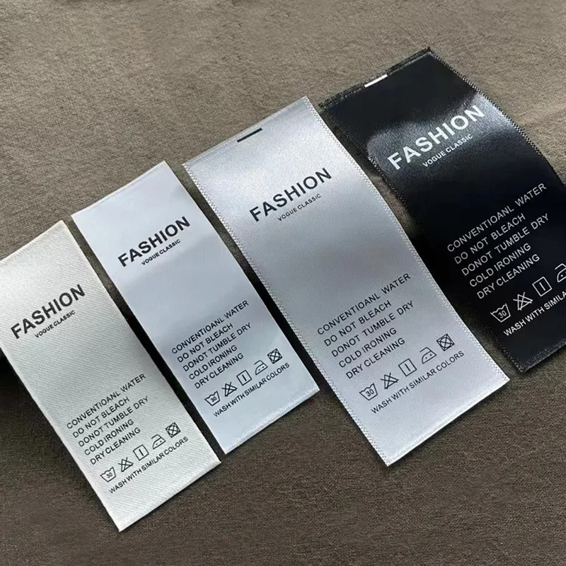 Maxsus logotip kiyim-kechak parvarishi yorligʻi bosilgan atlas lenta 100% polyester chaqaloq parvarishi yorliqlari