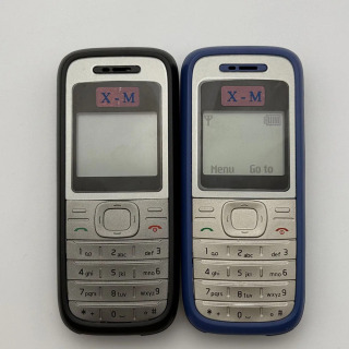 Original 1200 mobil telefoni qulfdan chiqarilgan 2G GSM 900/1800 mobil telefoni ingliz/arab klaviaturasi bilan. Shimoliy Amerika, Avstraliyada tarmoqsiz.