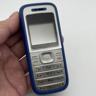 Original 1200 mobil telefoni qulfdan chiqarilgan 2G GSM 900/1800 mobil telefoni ingliz/arab klaviaturasi bilan. Shimoliy Amerika, Avstraliyada tarmoqsiz. Синий Пакет 1
