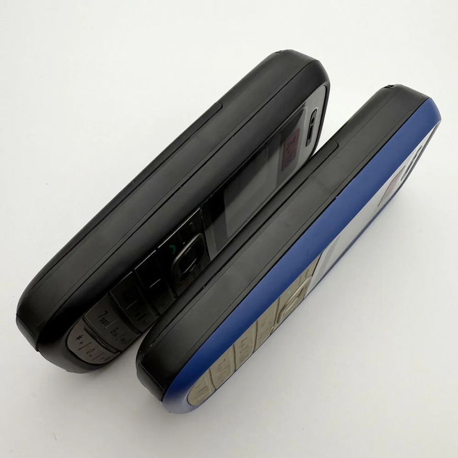 Original 1200 mobil telefoni qulfdan chiqarilgan 2G GSM 900/1800 mobil telefoni ingliz/arab klaviaturasi bilan. Shimoliy Amerika, Avstraliyada tarmoqsiz.