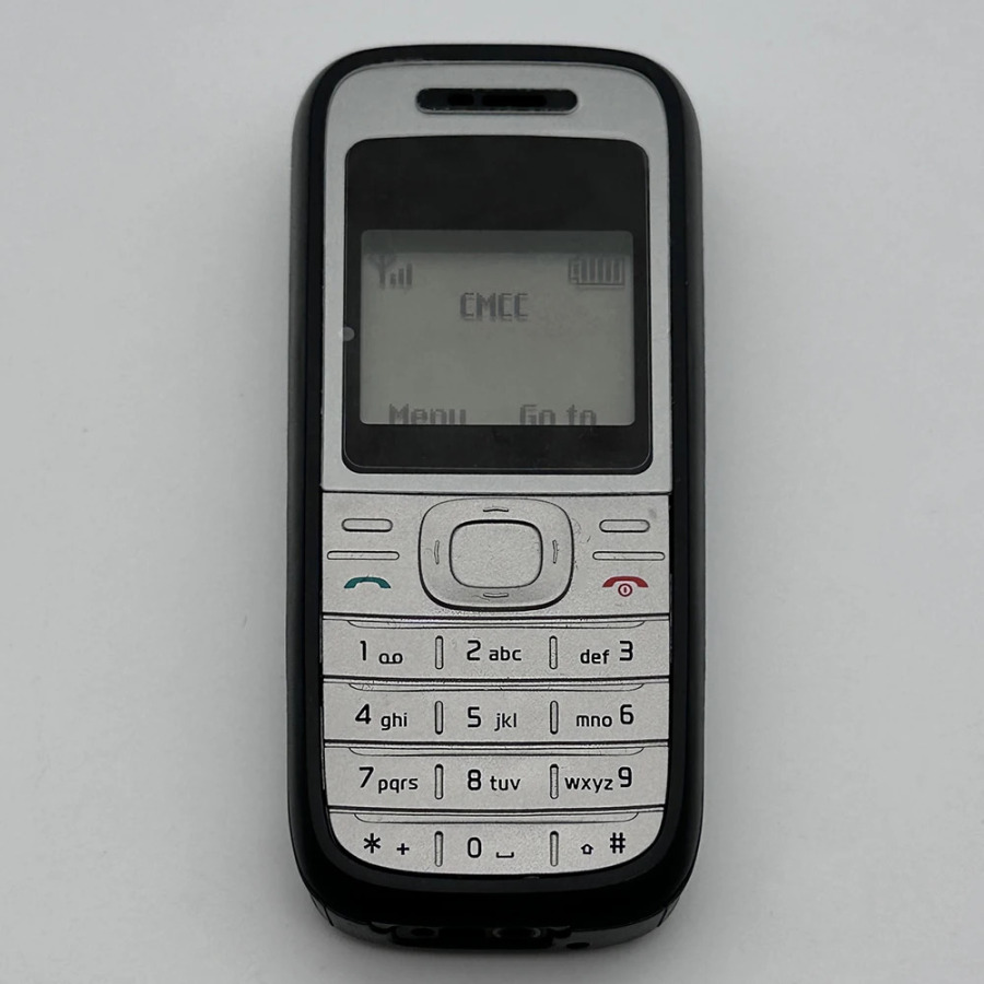 Original 1200 mobil telefon, qulfdan chiqarilgan 2G GSM 900/1800 mobil telefoni. Finlyandiyada ishlab chiqarilgan 2007. Shimoliy Amerikada ishlamaydi.